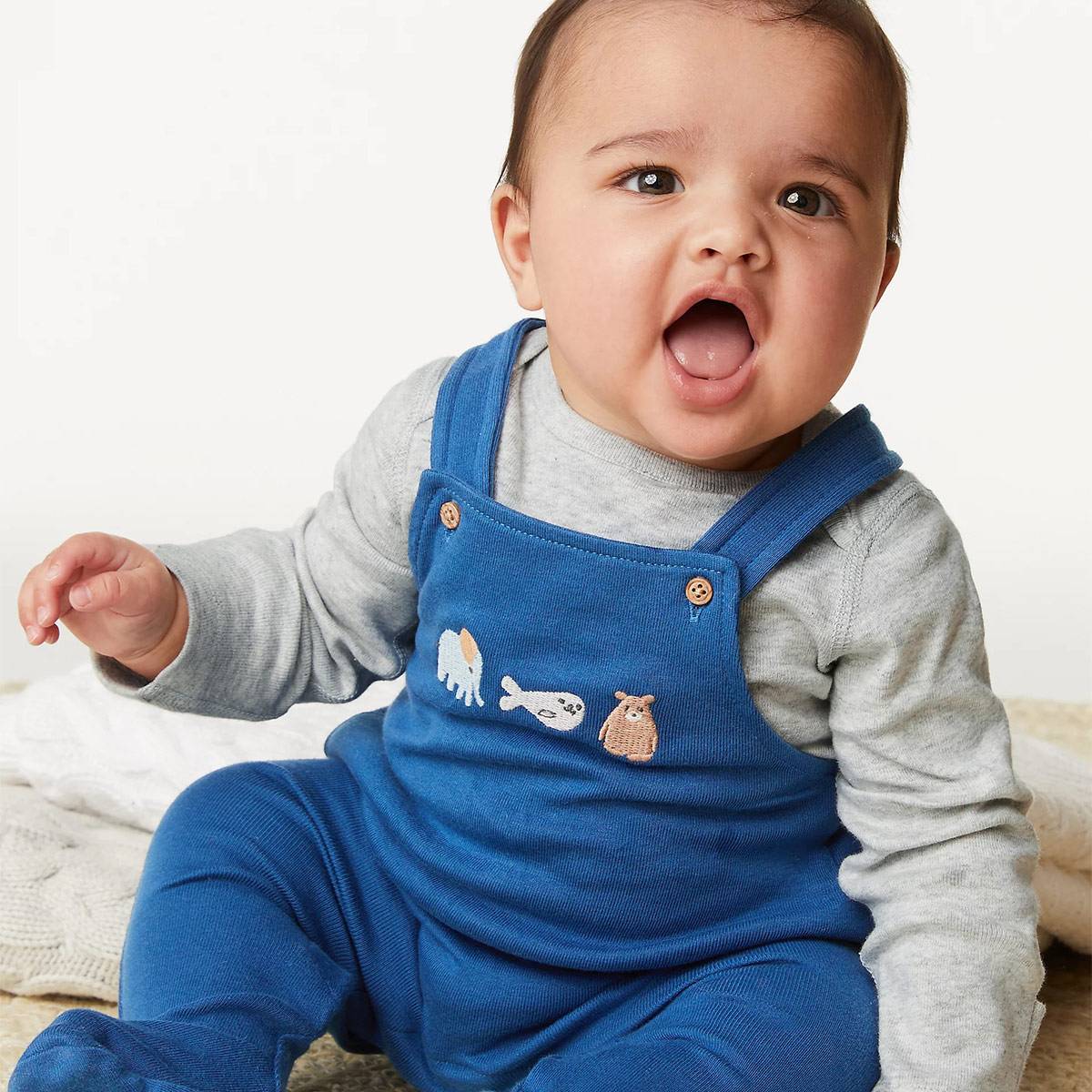 Baby boy wearing dungarees